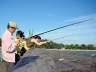 Fishing At Ambleside Beach Pier, Canada Stock Photographs